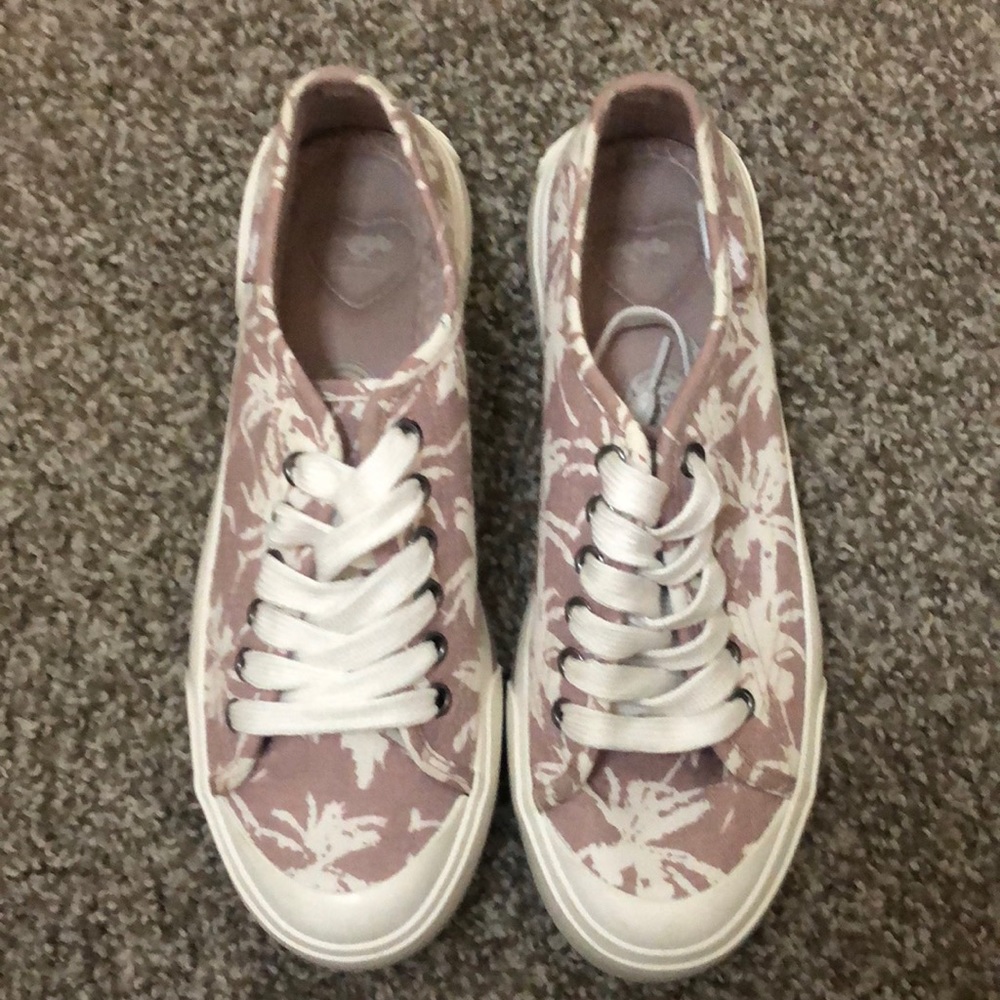 Super cute pink and ivory pattern lace up sneakers.
